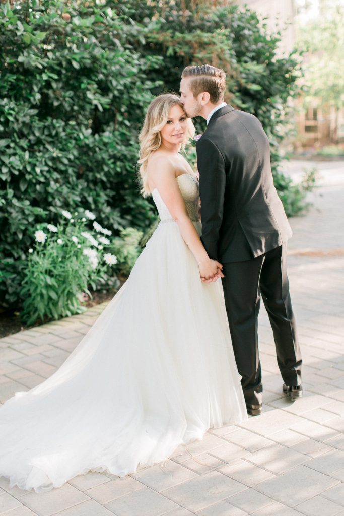 bride and groom at maravilla gardens for their outdoor rustic wedding blush and white 