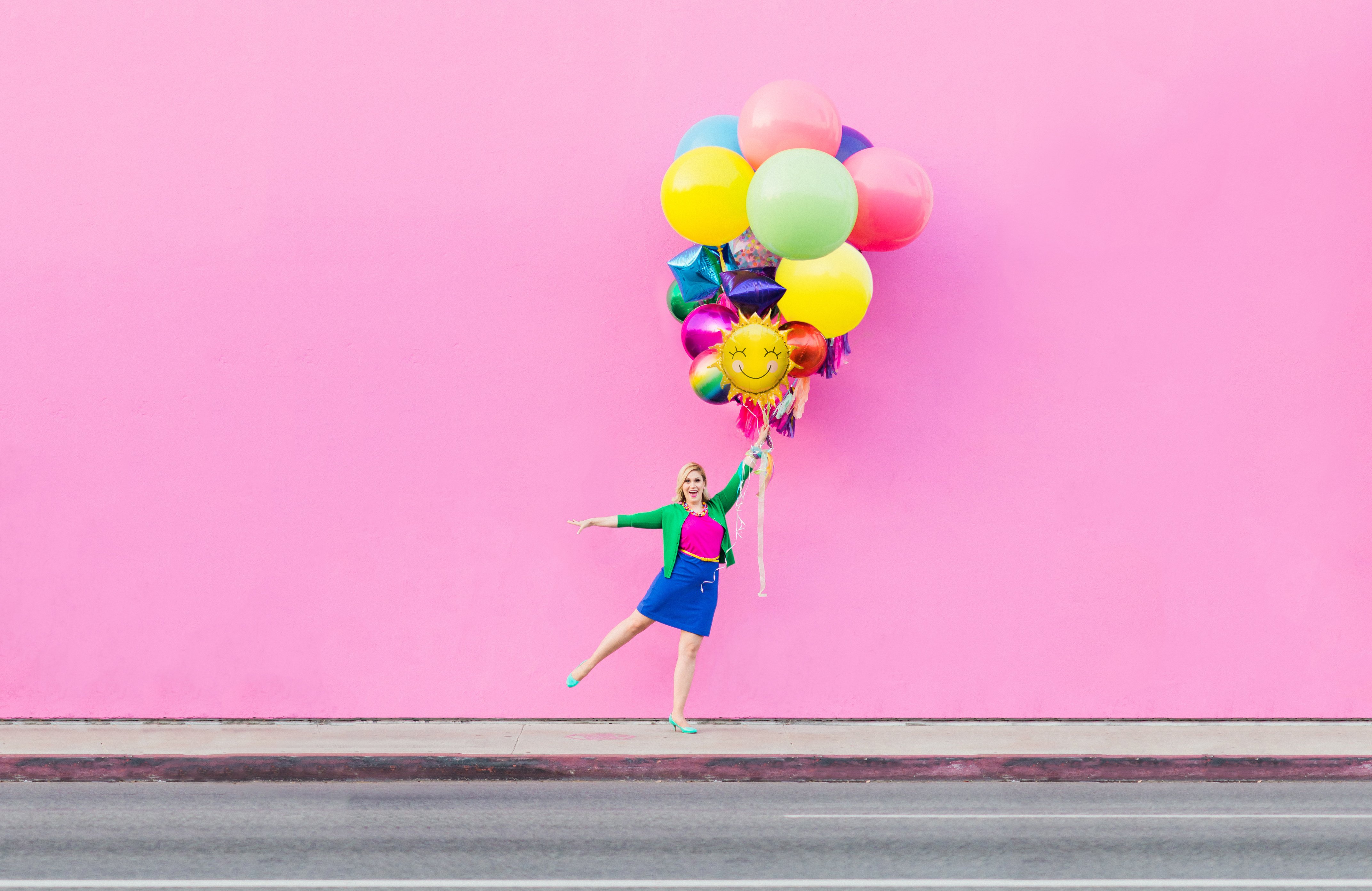 colorful balloons pink wall los angeles california rebrand photography colorful los angeles wedding planner