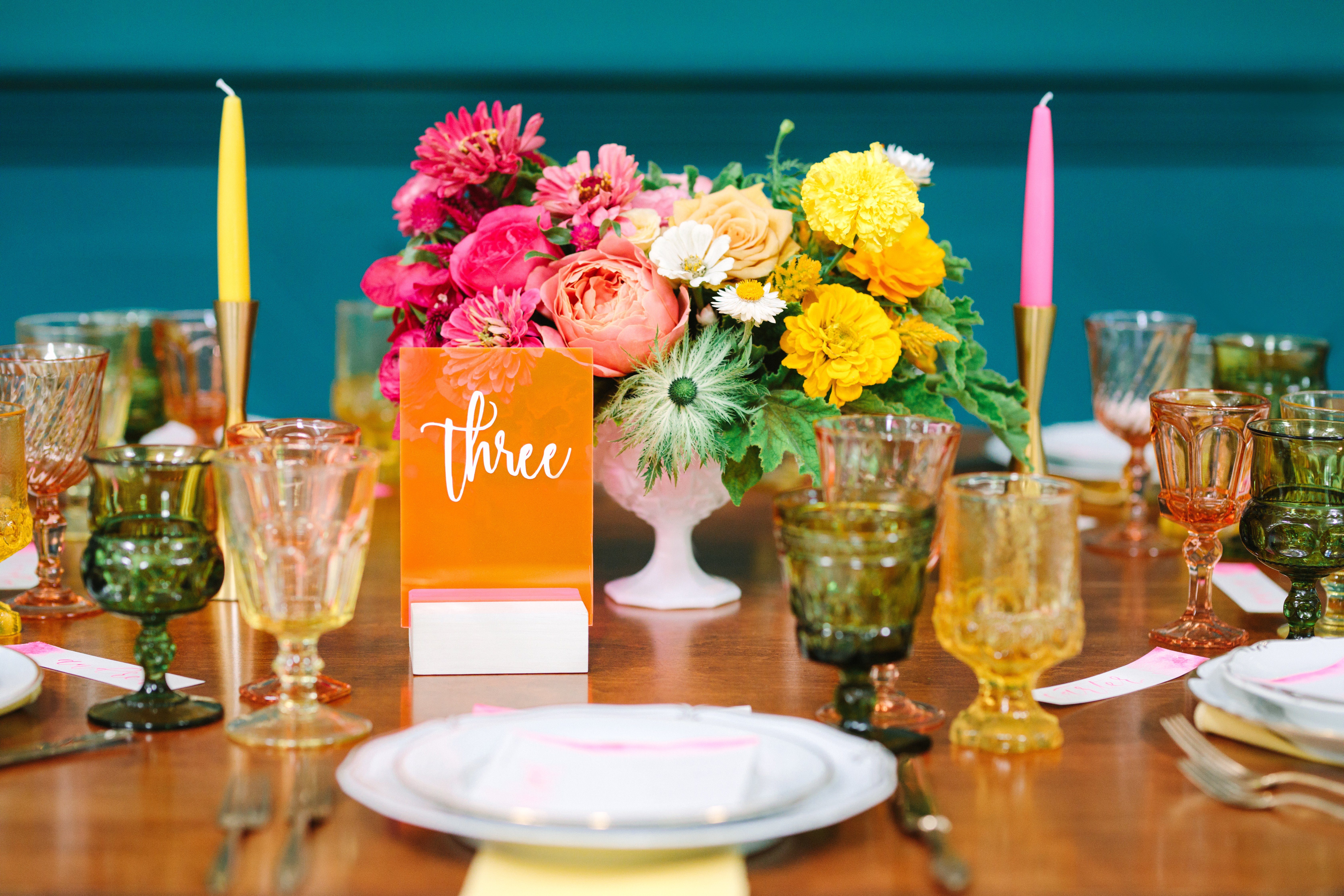 Colorful wedding tablescape with florals and vintage china at The Fig House in highland park, California.