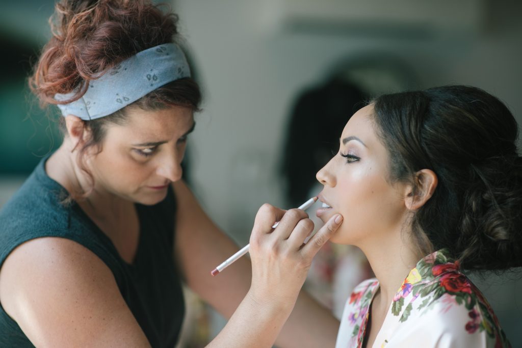 makeup artist and bride 