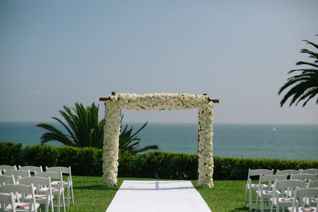 white floral arch 