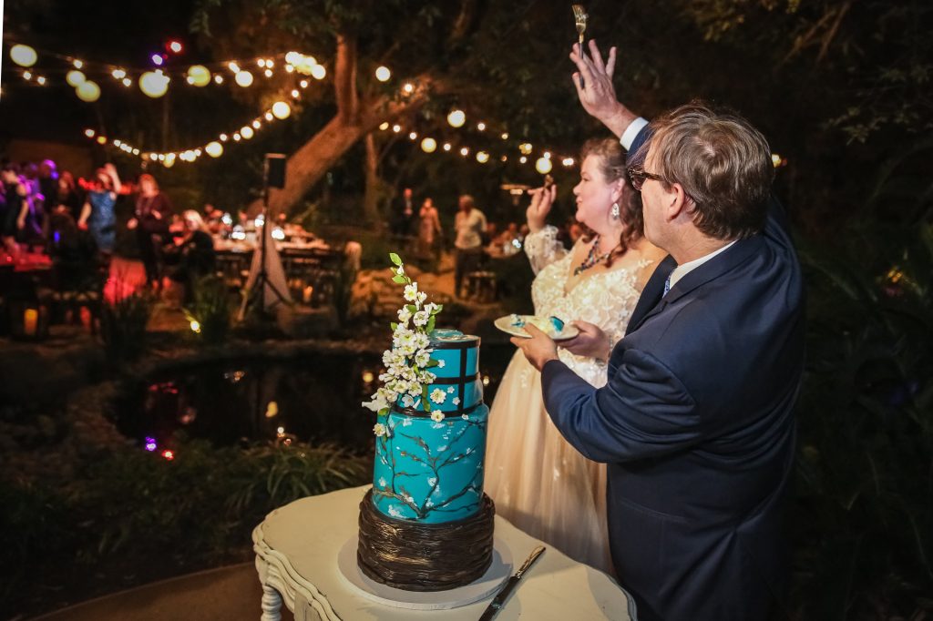wedding-cake-cutting-bride-groom
