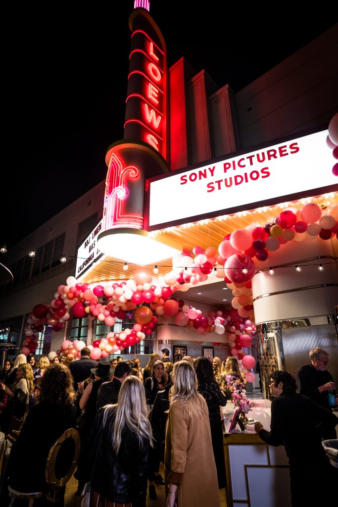 sony studios marquee with balloons at night