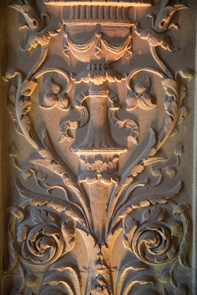 Ebell carved cement column