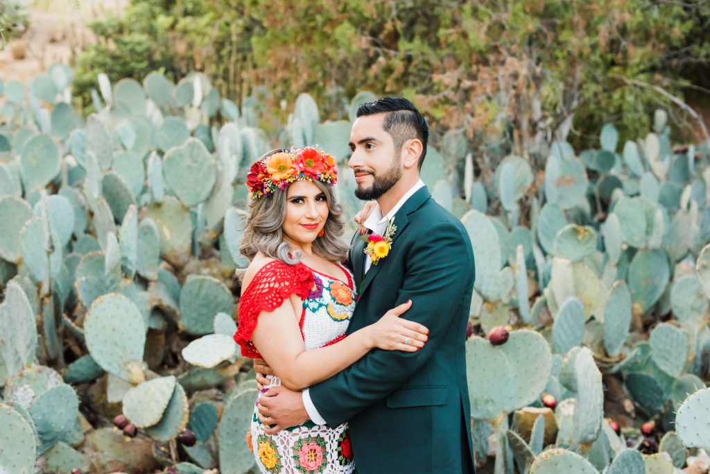 bride and groom in cactus
