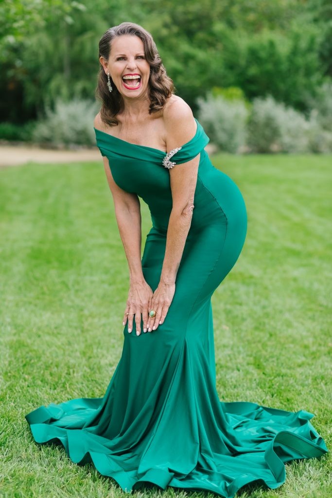 mature woman in green dress