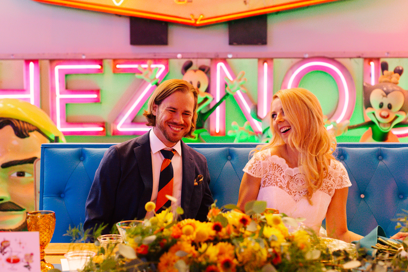 Eclectic Charm Wedding at The Valley Relics Museum - bride and groom laughing