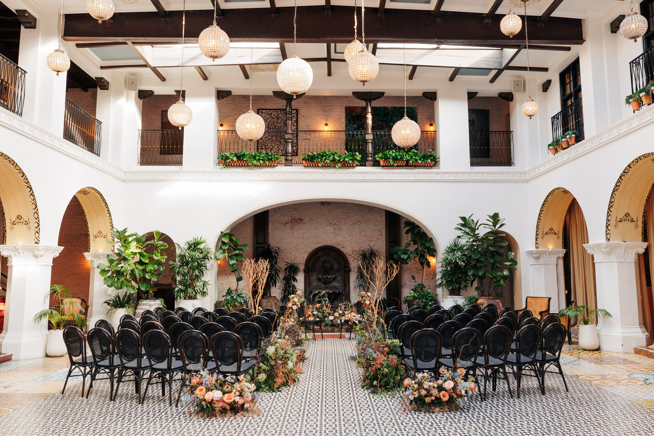 Ceremony site set up with chairs and flowers at Ebell of Long Beach