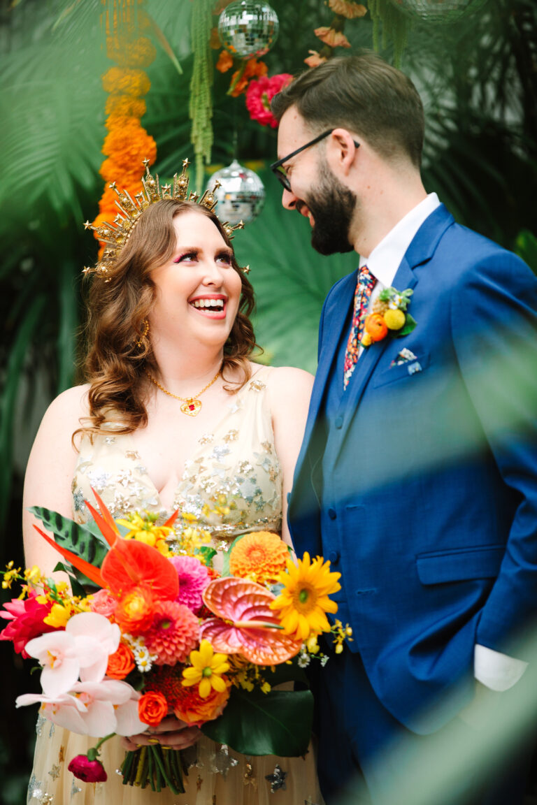 bride and groom laughing during ceremony