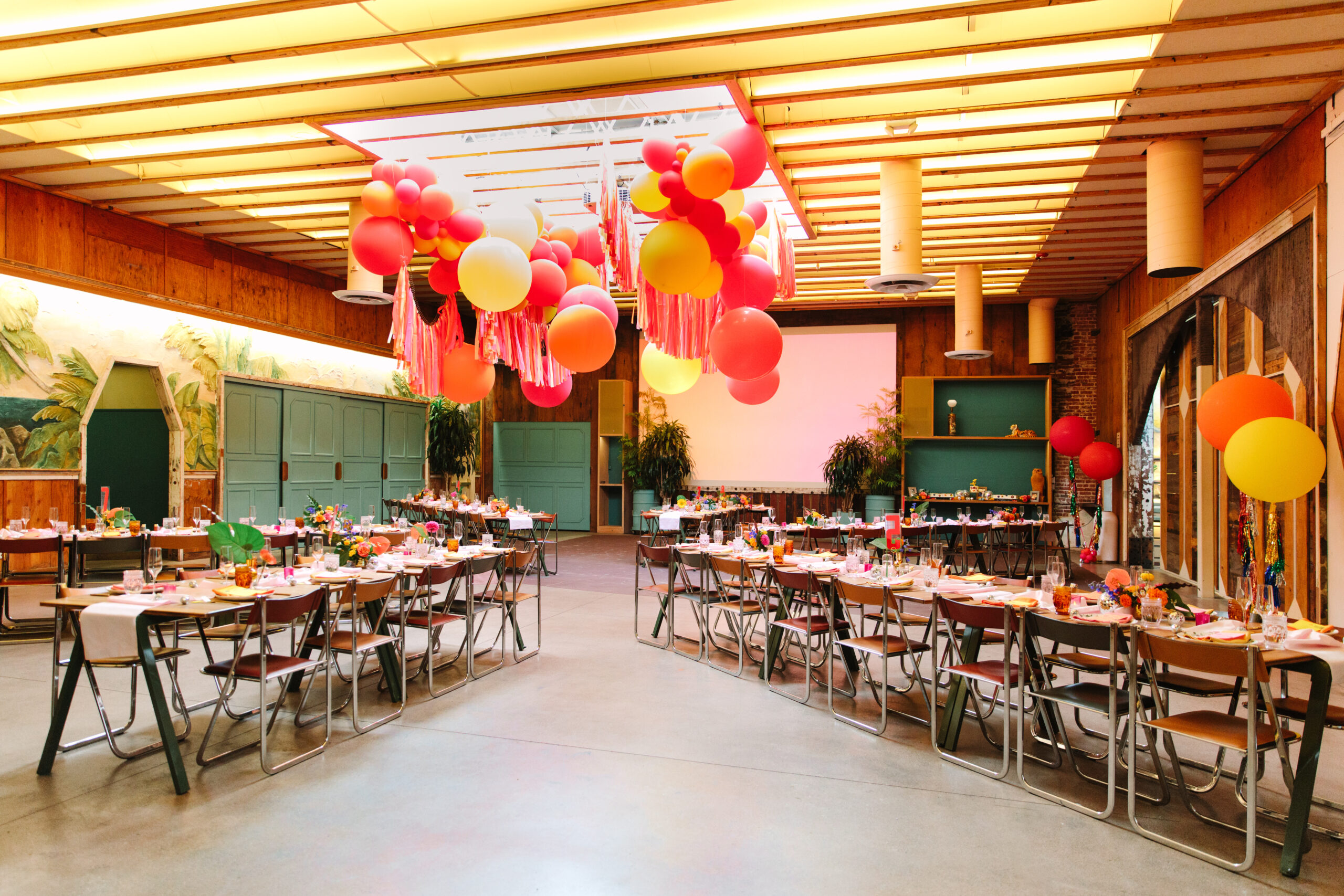 Colorful tables and chairs at Valentine in DTLA for wedding reception